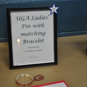 Ladies’ UGA pin and matching bracelet