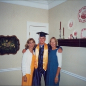 Nick with his mother and his aunt on his high school graduation in 2001.